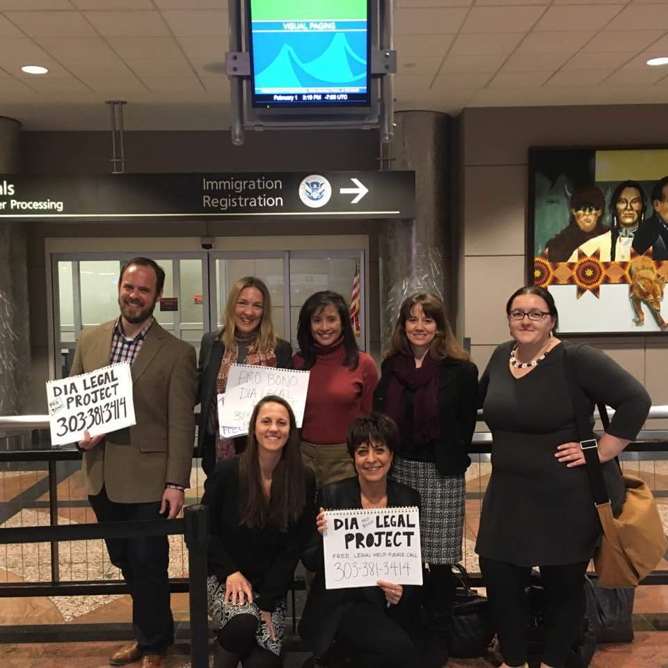 Senior Associate Attorney Abbie Weibel provides volunteer legal support to arriving immigrants at Denver International Airport